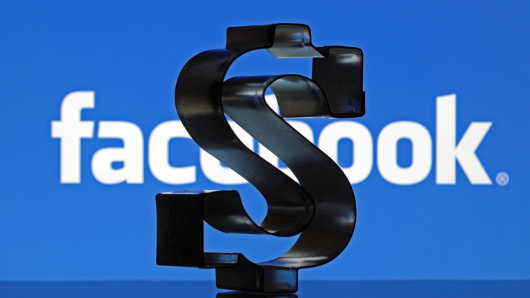 Dollarzeichen mit Facebook im Hintergrund