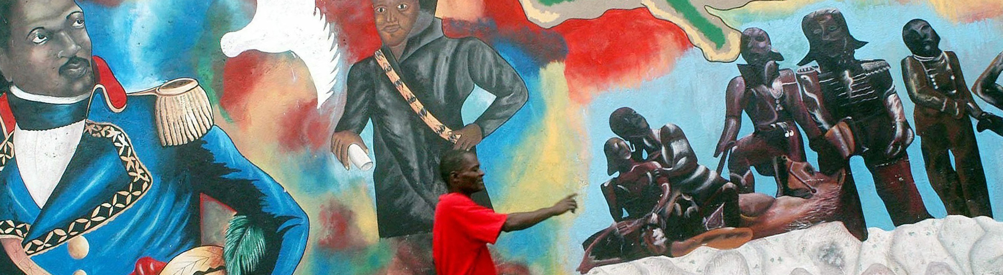 Ein Graffito in der haitianischen Hauptstadt Port-au-Prince zeigt zwei Männer in historischen Anzügen. Ebenso in Abstraktion Menschen scheinbarer in einer Kampfhandlung mit einem gefallen Pferd.