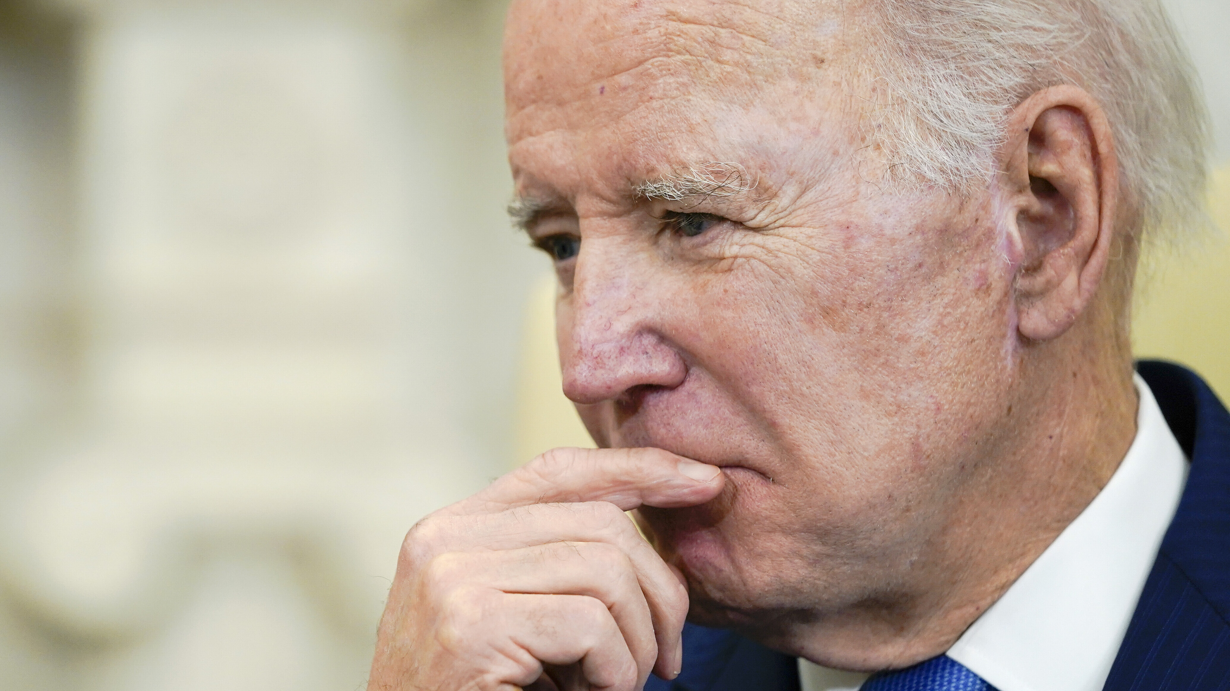 President Joe Biden listens during a meeting with Brazil's President Luiz Inacio Lula da Silva in the Oval Office of the White House