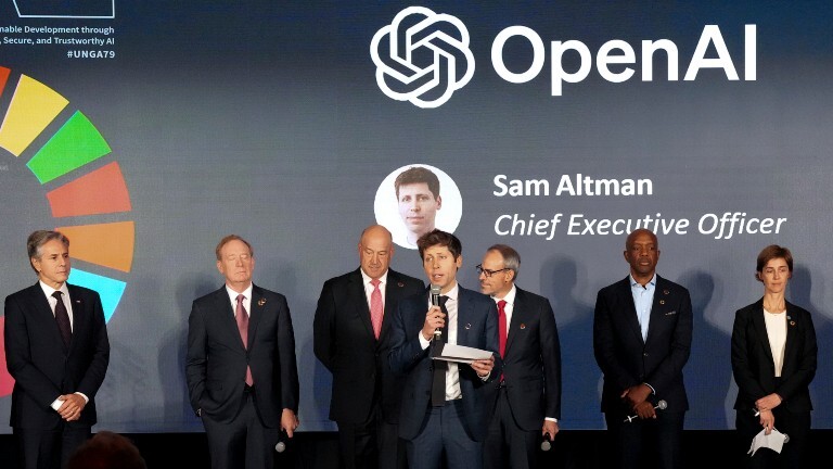 Open AI Chief Executive Officer Sam Altman (C) speaks at the Advancing Sustainable Development through Safe, Secure, and Trustworthy AI Event at Grand Central Terminal on Monday, Sept. 23, 204, in New York.