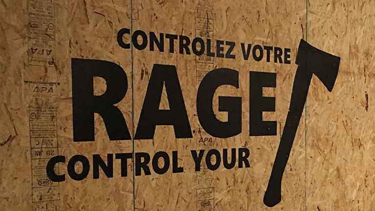Logo der Axtwerf-Halle "Rage Montreal" auf einer Wand