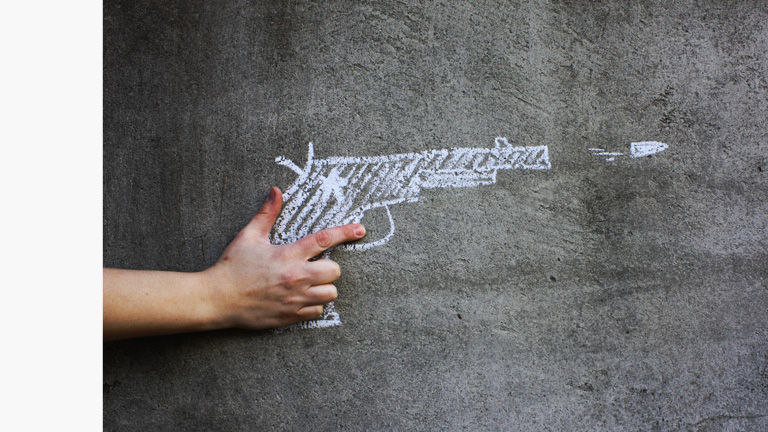 Auf Wand aufgemalte Waffe