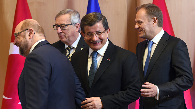 EU-Politiker mit dem türkischen Ministerpräsidenten am 7.3.16
