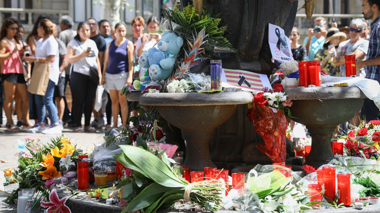 Dignitaries and residents of Barcelona gather in Placa de Catalunya to observe a one minute's silence for the victims of yesterday's terrorist attack, on August 18, 2017 in Barcelona, Spain.