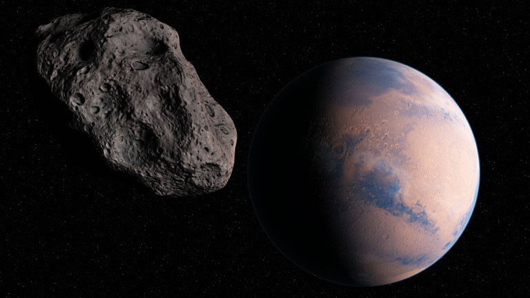 Symbolbild: Asteroid und Planet