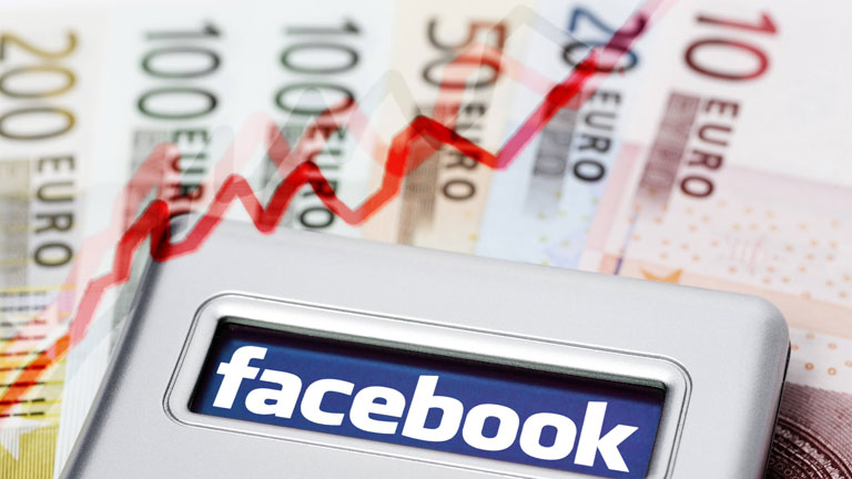 Facebook-Logo auf Smartphone, Geldscheine, steigender Kurswert