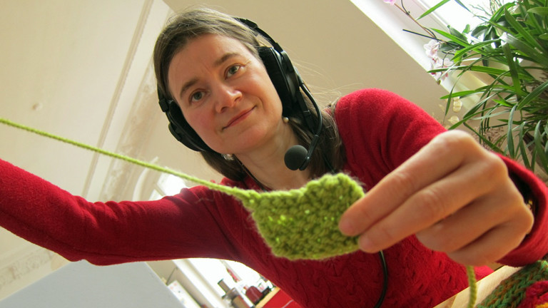 Ein grüner Topflappen.