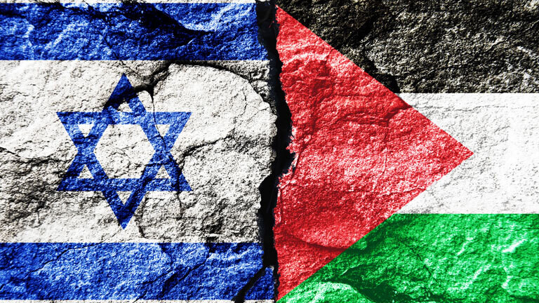Symbolbild: Nahost-Konflikt. Fahnen von Israel und Palästina mit Riss